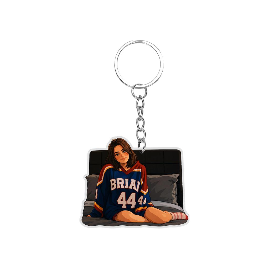Acrylic Keychain Featuring Four Ice Hockey Players Standing Side by Side Wearing Numbered Jerseys with Attached Metal Key Ring for Easy Carrying