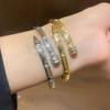 18K Gold Plated Zircon Arrow Geometric Bangle: Elegant High-End Design Bracelet for Women.