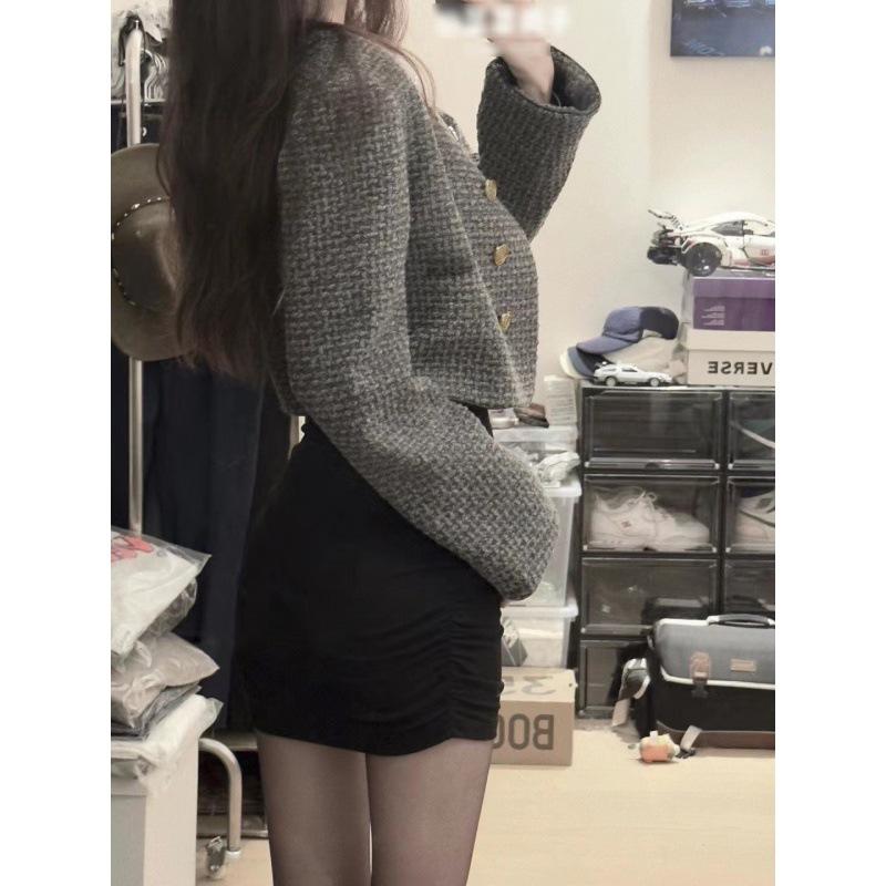 The new black Spice Girl sexy primer dress for children in autumn and winter with a coat and a stepmother hip skirt inside.