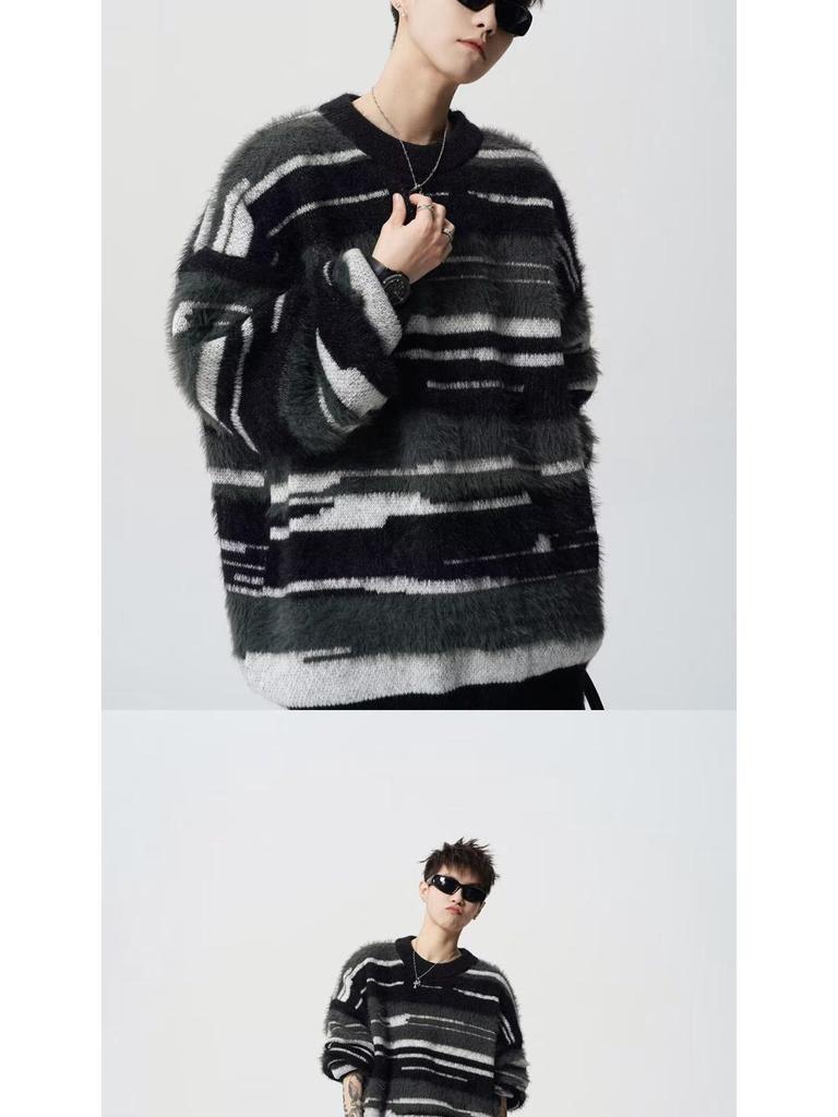 Herrhöstens/vinterns färgrandiga löst stickade tröja