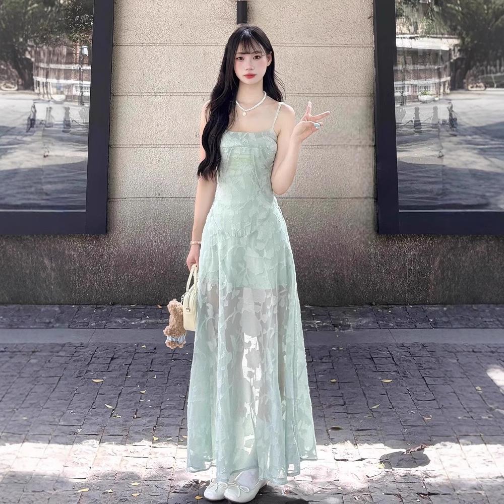 Seaside vacation wind green suspender dress women's summer temperament mesh stitching waist thin a-word skirt long dress