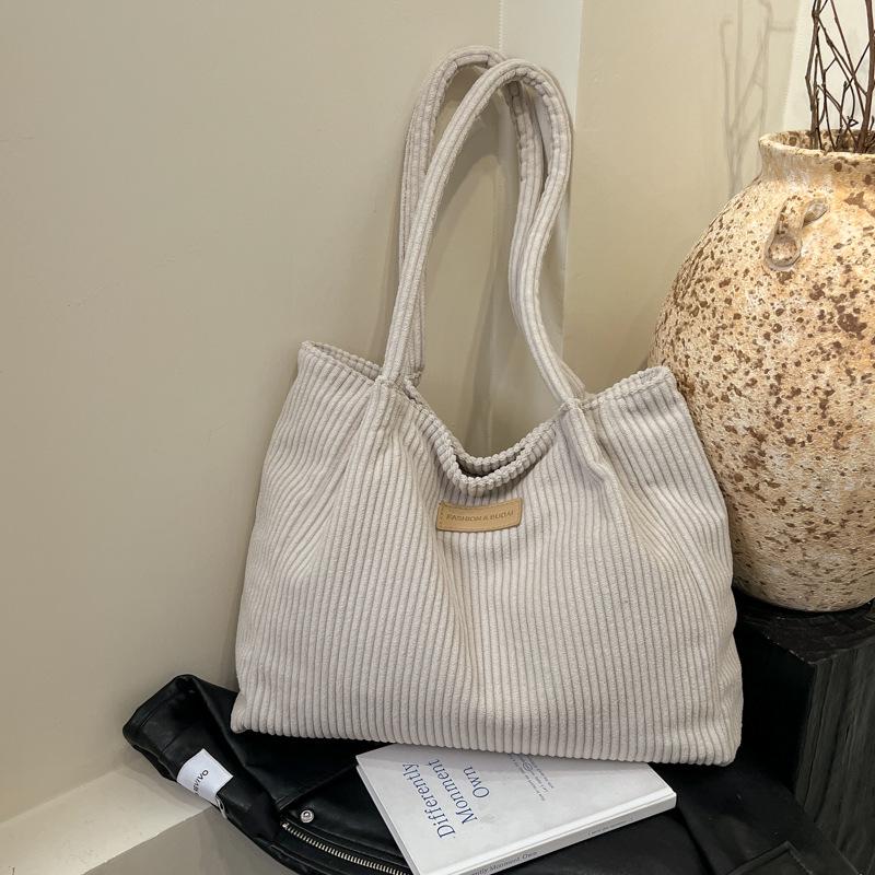 

2025 Ранняя весна Корейский стиль Однотонная сумка на плечо и тоут для женщин белый