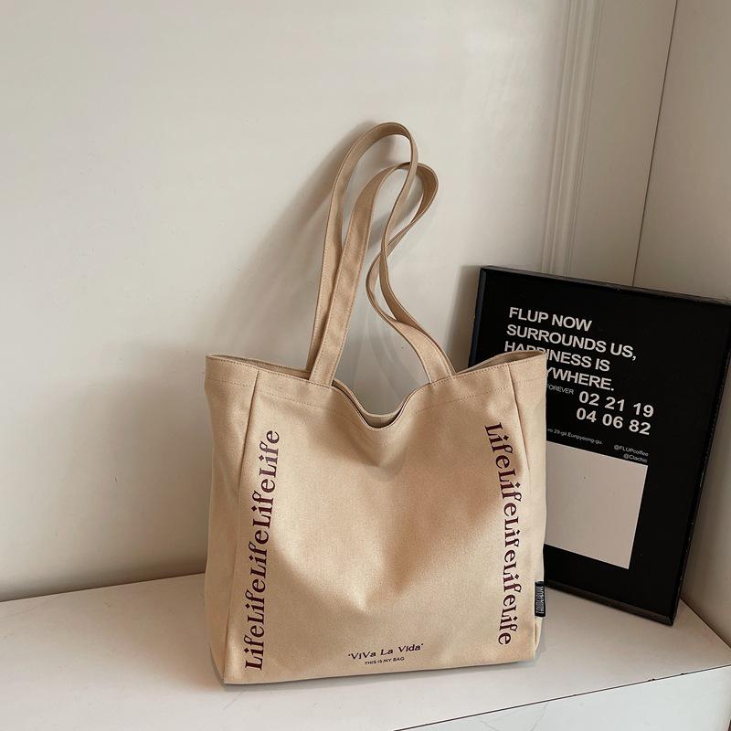 

Versatile 2025 Canvas Tote Bag: Stylish Textured Shoulder Bag for Casual Use хакі