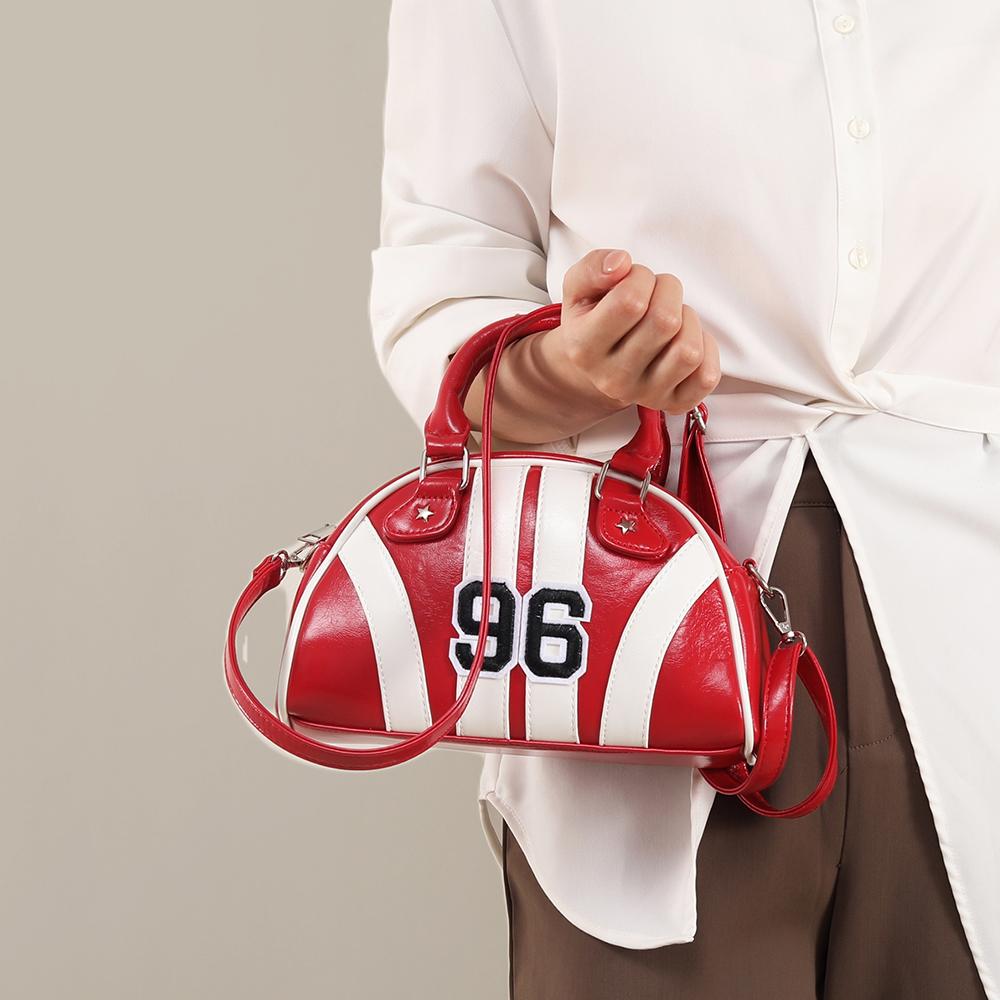 Red hard and three-dimensional striped tote bag with a sense of luxury, suitable for crossbody or hand-held use.