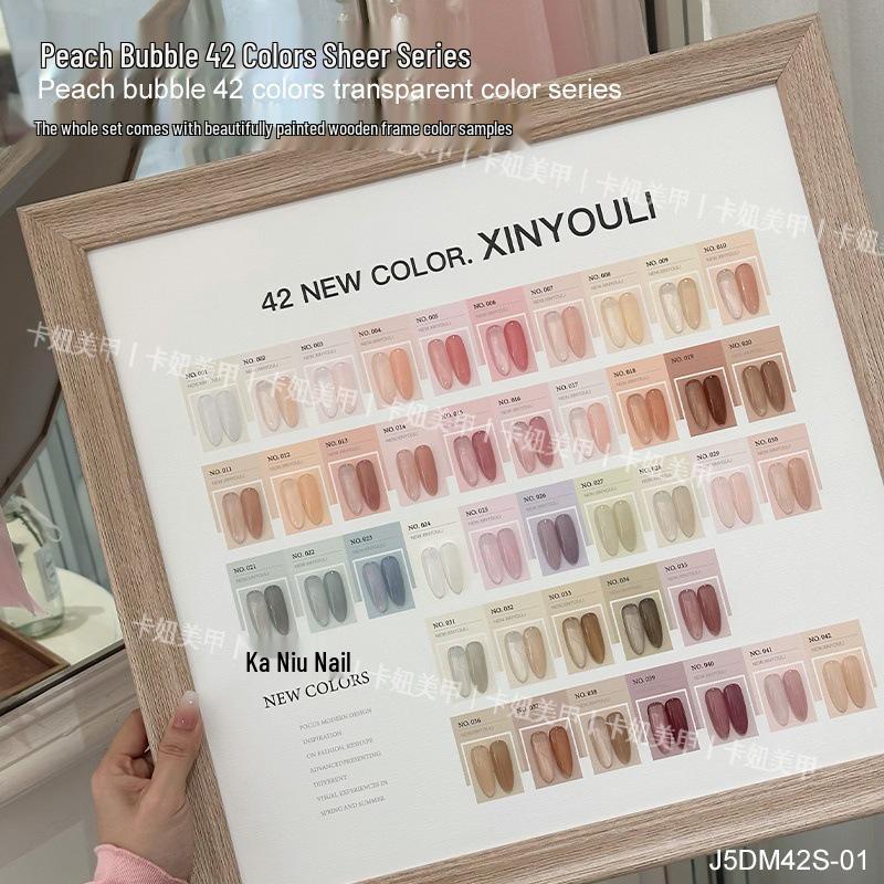 

Xin Youli 25th Anniversary Exclusive: 42-Color Peach Bubble Gel Polish Set with Whitening, Jade, Nude, and Transparent Shades.