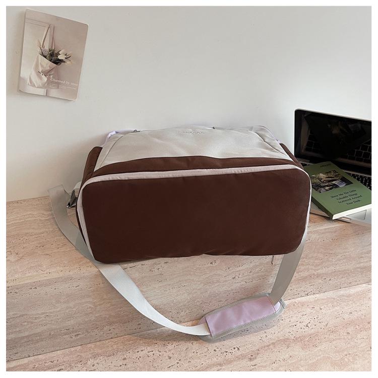 Large Capacity Casual Travel Bag: New Style Lightweight Handheld & Shoulder Luggage Storage for Couples