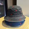 Spring and summer versatile heart-embroidered blue denim bucket hat for women, with wide brim that makes the face look smaller, provides sun