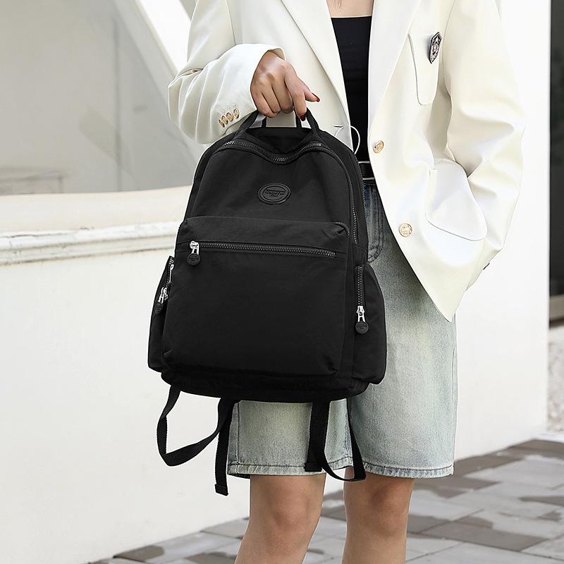 Neuer Rucksack Modetrend Rucksack mit großer Kapazität Reise kann Trolley befestigen