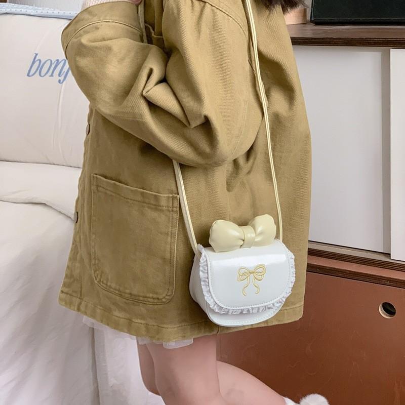 Urban Minimalist Girls Small Leather Crossbody Bag With Bow And Zipper Closure For Daily Use
