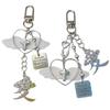 Practical Modern Crosses and Bowknot Keychain Designs for The Fashionable and Accessory Enthusiasts Stylish Outfits