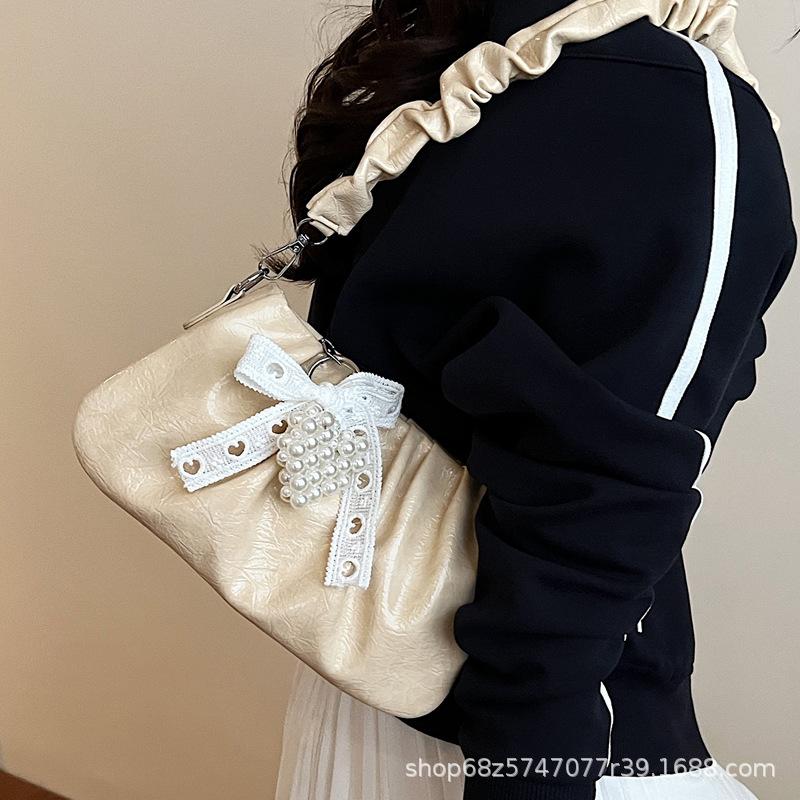 Niche design bag women's 2025 new casual Korean version messenger bag fashion shoulder pleated cloud bag