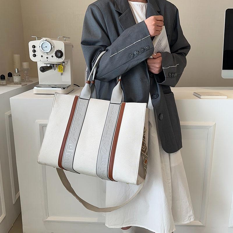 Commuter tote bag new large-capacity handbag women's 2025 broadband high-end sense work fashion messenger bag