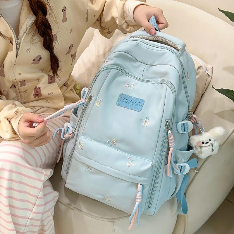 New schoolbag female junior high school college student small fresh bow large capacity backpack dopamine backpack