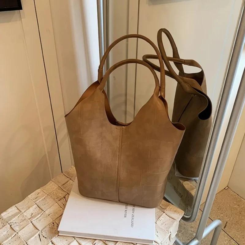 Large capacity solid color PU bucket bag for women  elegant shoulder bag buckle  soft versatile women's bag
