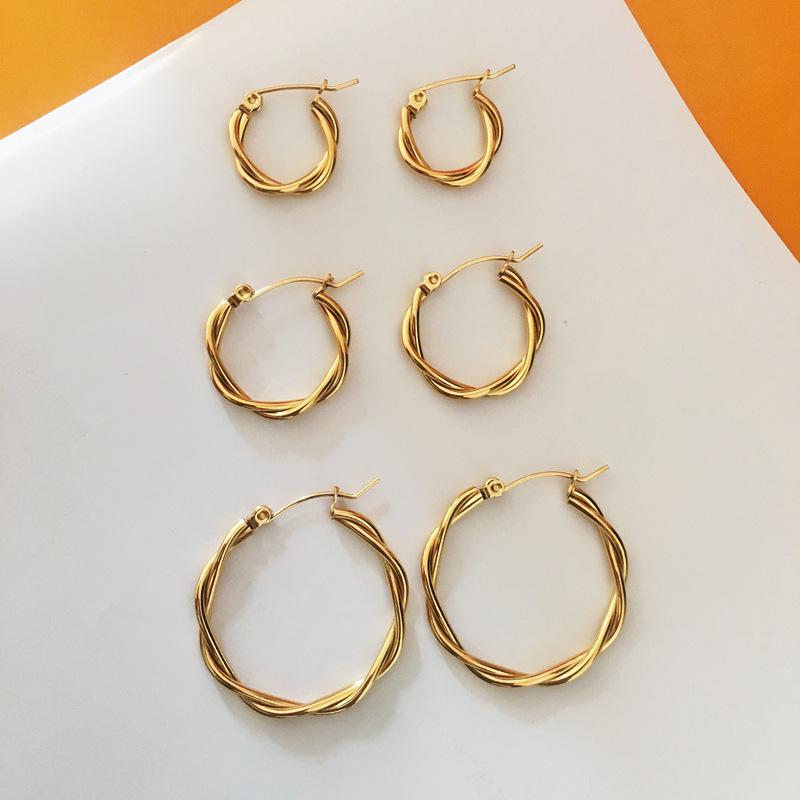 French Retro Gold-Plated Twisted Hoop Earrings - Titanium Steel Studs for Women, European-American Fashion.