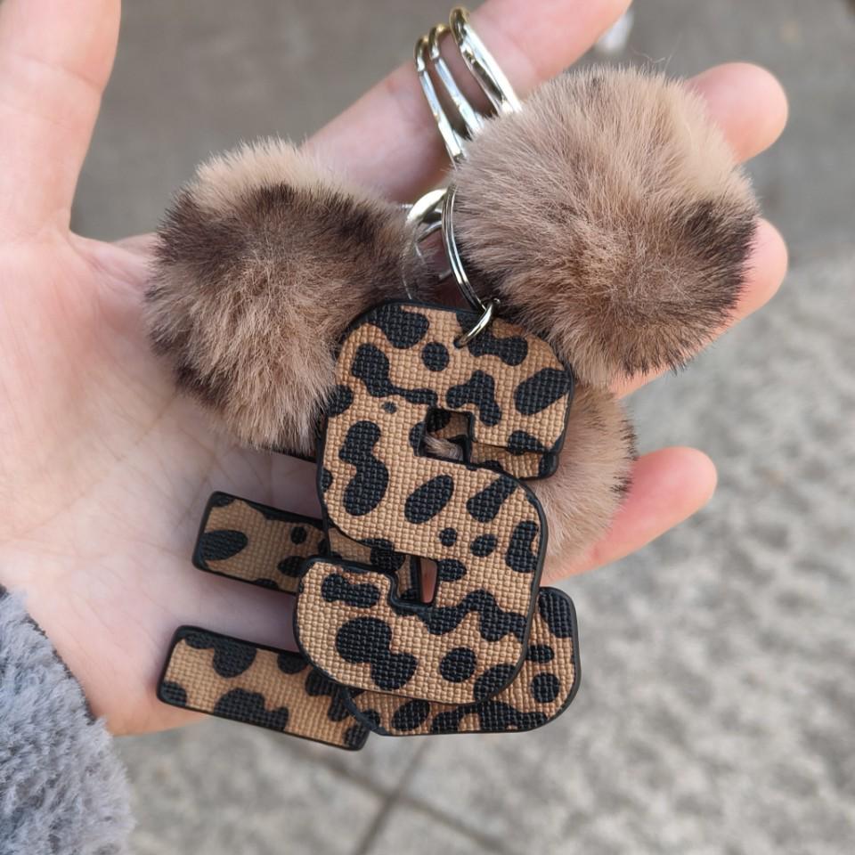 Western Cowboy Leopard Print Leather Keychain with Plush Ball Accessory