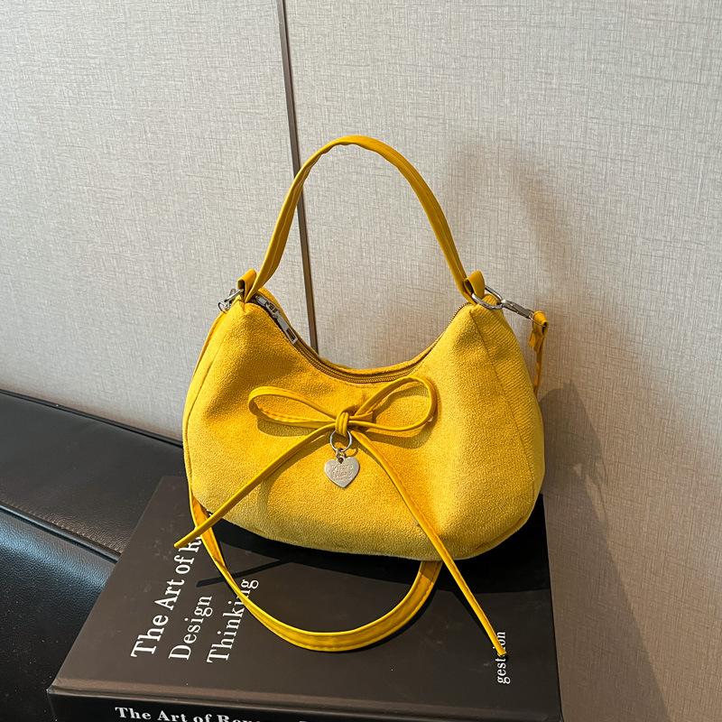 

High-end niche design handbag women s small bag 2025 autumn and winter new fashion versatile commuter messenger bag bag жёлтый