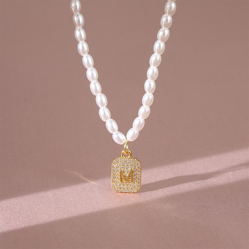 

Легкая роскошь ожерелье из пресноводного жемчуга женское высокая ценность простое и универсальное микро-инкрустированное кулон M бренд ключичная цепочка