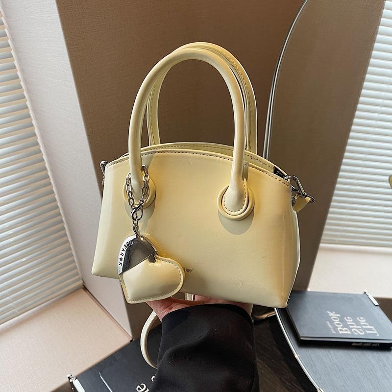 Niche Fashion Hand-carried Shell Bag Women's New Versatile Shoulder Bag Simple Casual Messenger Bag