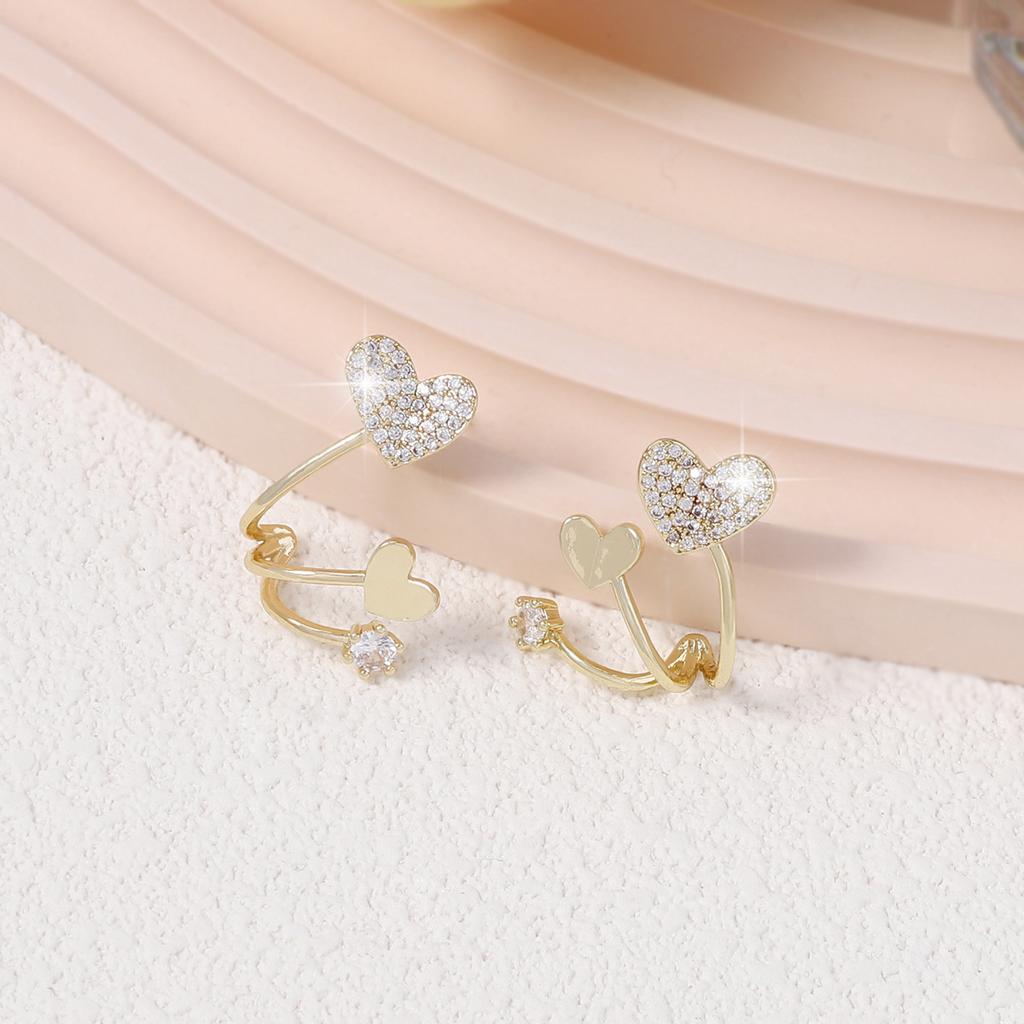 Korean version of the new niche design zirconium diamond double love three-line fishtail exquisite earrings, double peach heart simple model