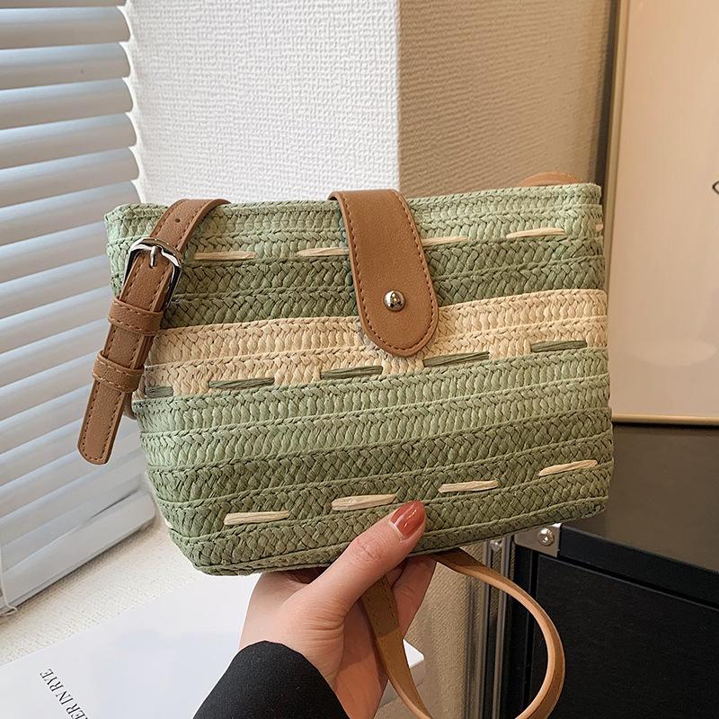Portable woven straw bag women's 2025 new versatile high-end spring summer seaside vacation beach bag
