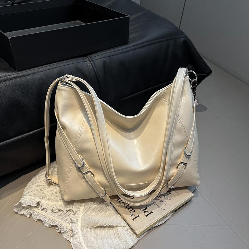 

Женская сумка-тоут большой вместимости 2025 новая осенне-зимняя ретро повседневная на плечо сумка для поездок многофункциональный рюкзак белый