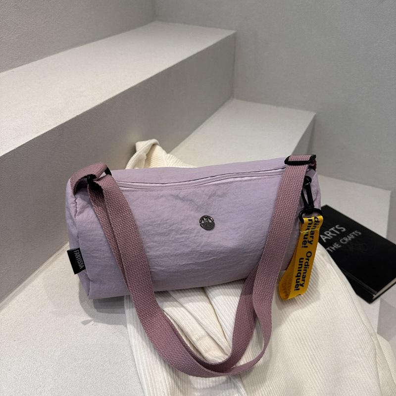 

Summer new solid color simple casual cylindrical tote bag shoulder bag large capacity lightweight messenger bag фіолетовий