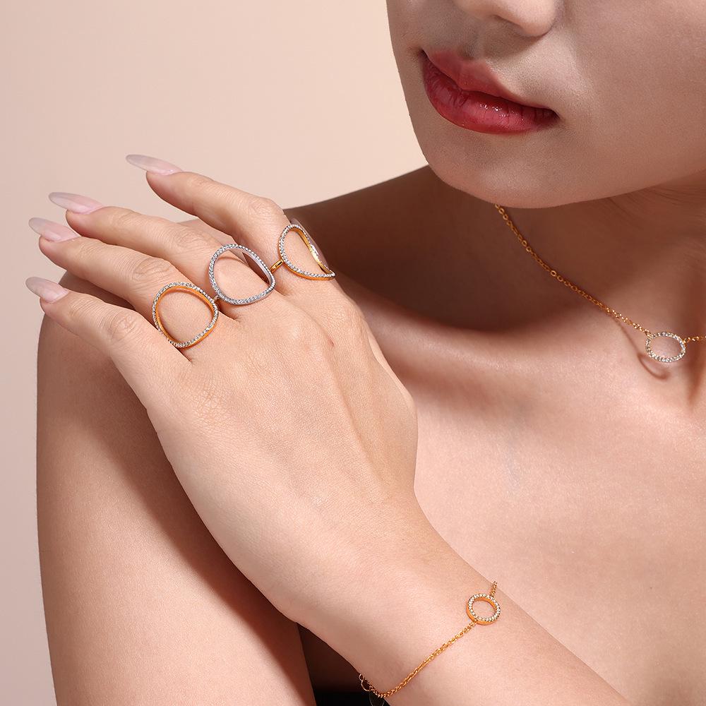 Exquisite Niche Zirconium Titanium Steel Jewelry Set: 18k Gold Plated Ring, Bracelet, and Temperament Necklace.