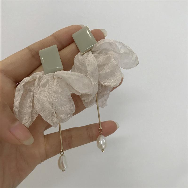 Silver needle ins wind small fresh pearl flannel bow stud earrings Dongdaemun student natural wind earrings earrings batch
