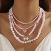 European and American idyllic style sweet and cute soft pottery strawberry bow love stacking necklace contrasting color imitation pearl necklace women
