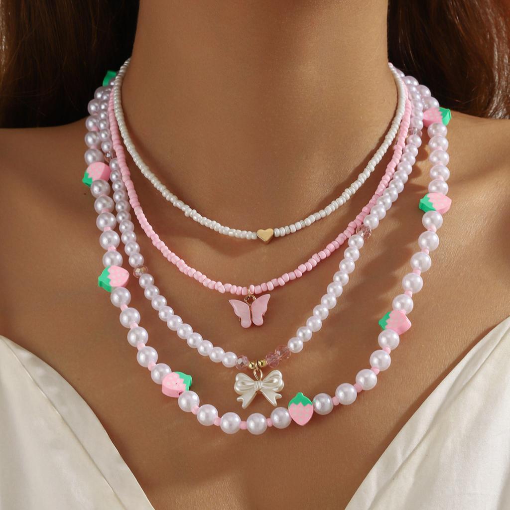 European and American idyllic style sweet and cute soft pottery strawberry bow love stacking necklace contrasting color imitation pearl necklace women