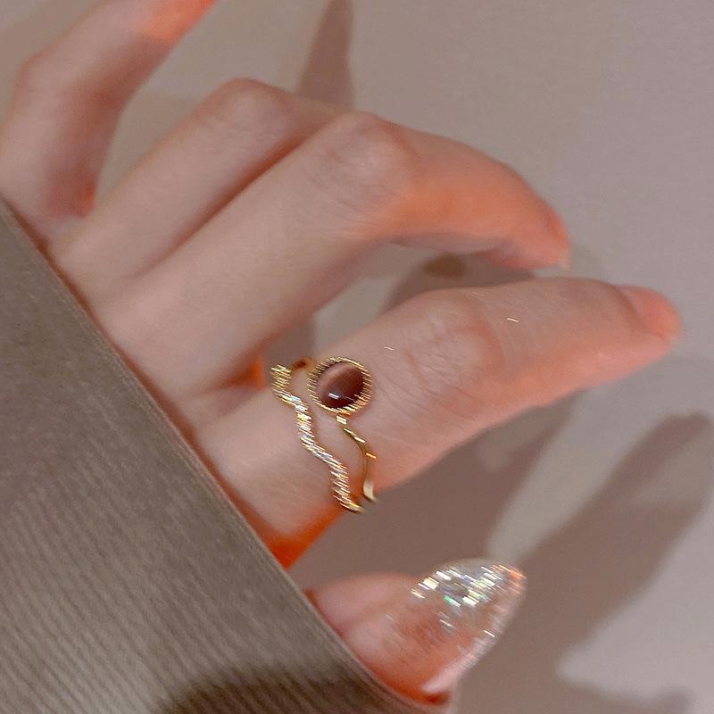 Electroplated Korean artificial opal zir*****pen ring, a sexy index finger ring jewelry.