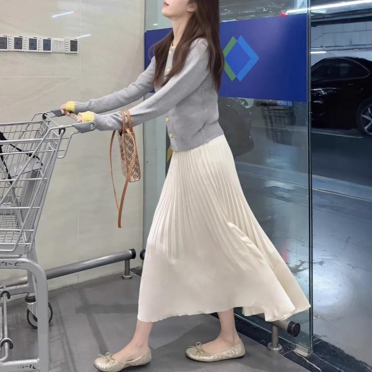 

Elegant Cream A-Line Midi Skirt: High-Waisted, Pleated, Flowy, and Beautiful. L