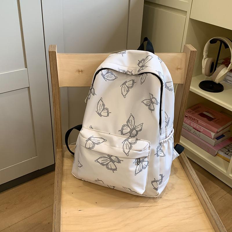 New simple cartoon butterfly backpack, primary and secondary school student campus schoolbag, large capacity and lightweight travel backpack