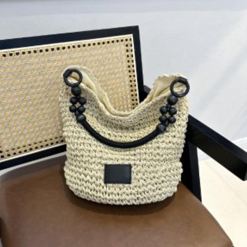 Taschen Damen Retro geflochtene Taschen Fauler Stil große Kapazität ausgehöhlte Strandtaschen Kontrastfarbe Unterarm-Beuteltaschen