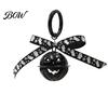 Halloween Backpacks Charm Pumpkin Bell Keychain, Hollow Head Key Ring with Ribbon Bow, for Holiday Party Decoration Keychain