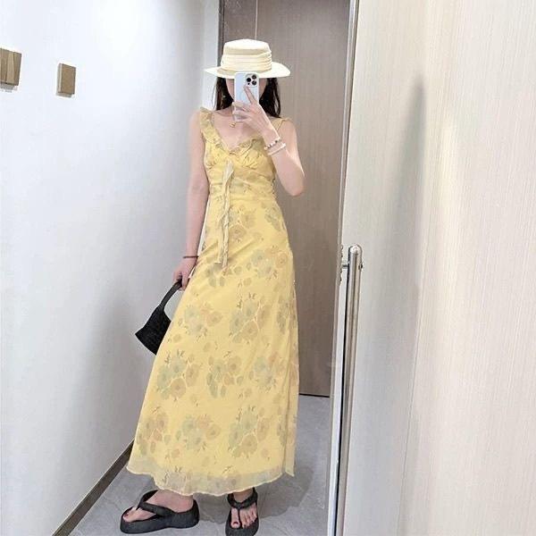 Coffee break French yellow floral suspender dress seaside vacation beautiful ruffle leaf temperament waist dress