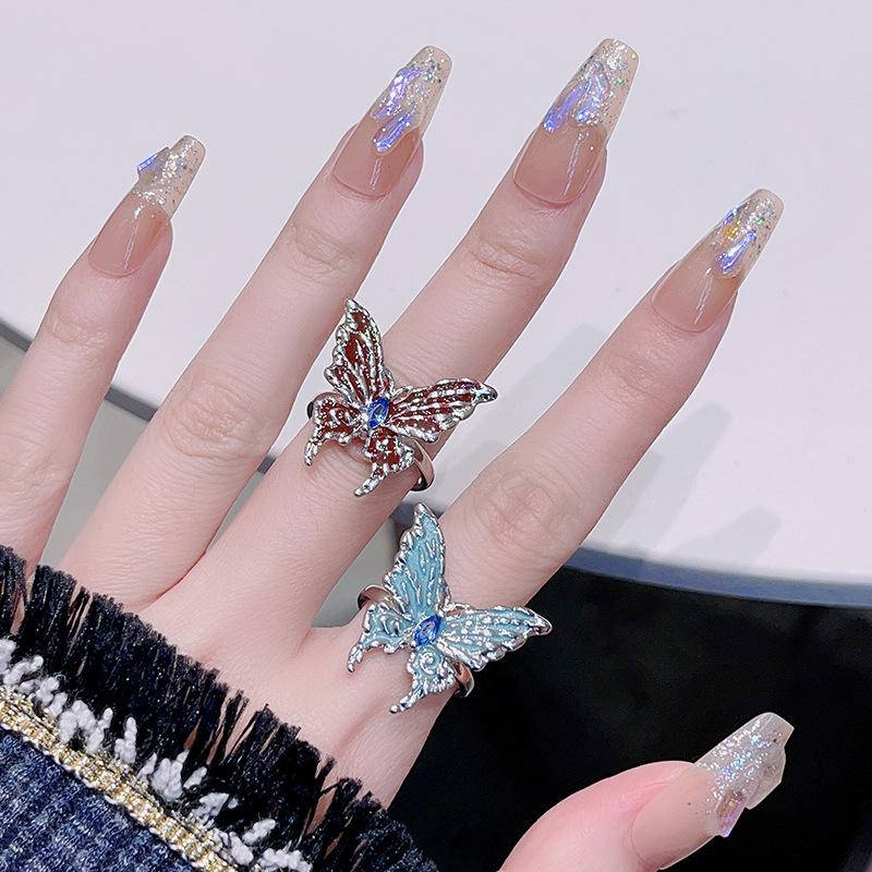 Pierścionek Otwierany z Motylem Trójwymiarowy z Nierównomiernym Kropleniem Oleju Damski Niszowy Design Regulowany Pierścionek na Palec Wskazujący Pierścionek Zimny Wiatr