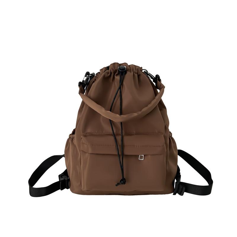 Daily versatile student schoolbag new niche design drawstring bundle shoulder bag simple commuter backpack women