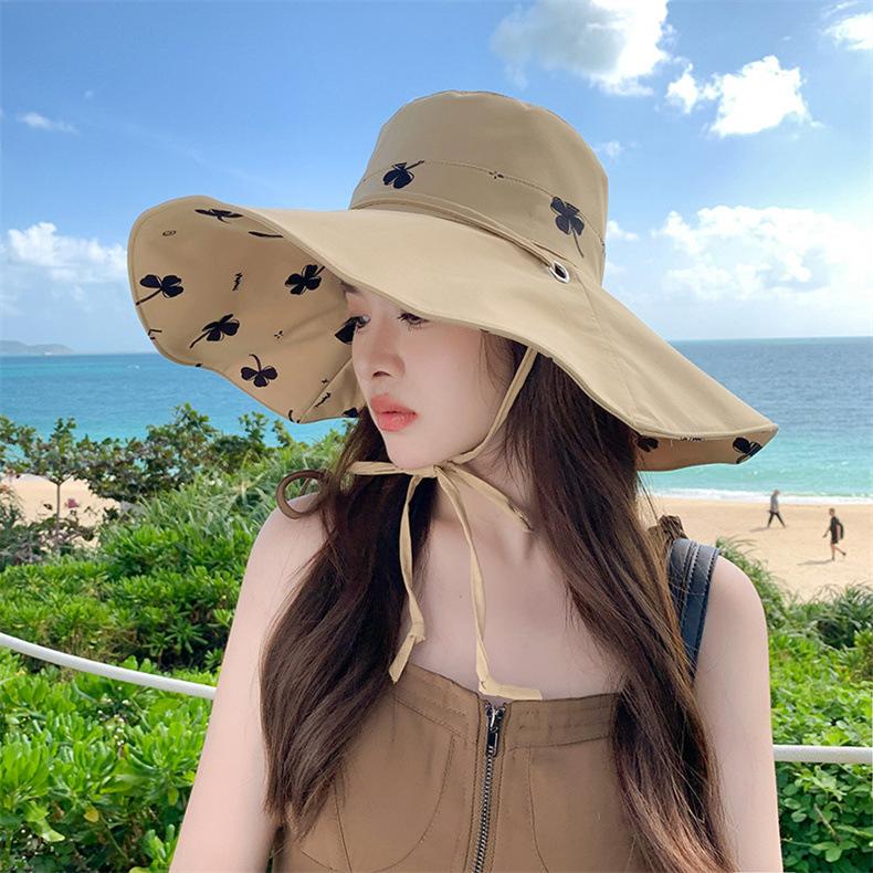 Summer seaside beach sun hat versatile outdoor big eaves bucket hat women's cotton and linen double-sided can wear four seasons sun protection hat