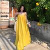Seaside vacation sexy backless suspender dress women's summer new loose a-word skirt gentle yellow long skirt