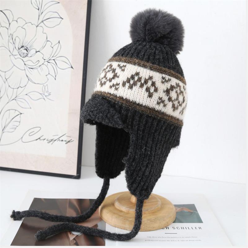 Autumn and Winter Warm Knitted Hat Women's Travel Versatile Bag Head Hat Cold Protection Ear Straps Wool Lei Feng Hat