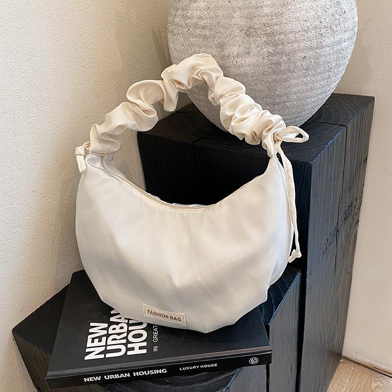 Niche underarm bag new versatile solid color shoulder messenger bag pleated dumpling tote bag women