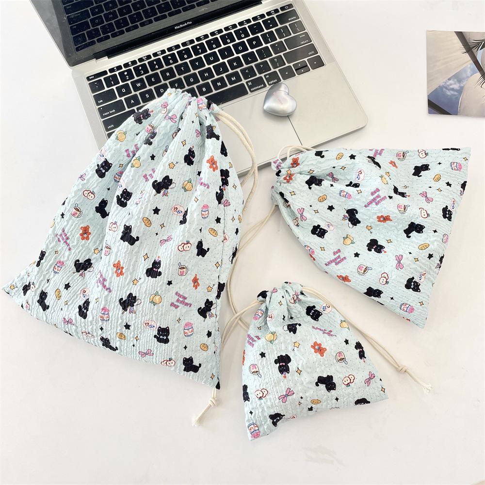 Embossed Cartoon Drawstring Bag - Dustproof Portable Cloth Organizer for Cosmetics