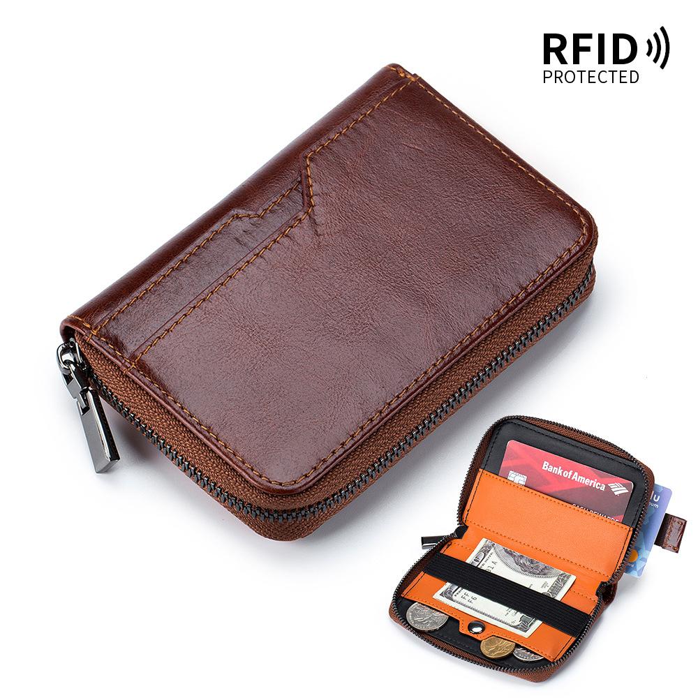 

Первый слой коровьей кожи, ретро мужской короткий кошелек для мелочи, европейский и американский вертикальный зажим для долларов, RFID многокарточный выдвижной картхолдер. коричневый