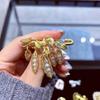 Golden Pearl Pea Pod Tassel Brooch: Elegant Retro Pin for Women's Fashion
