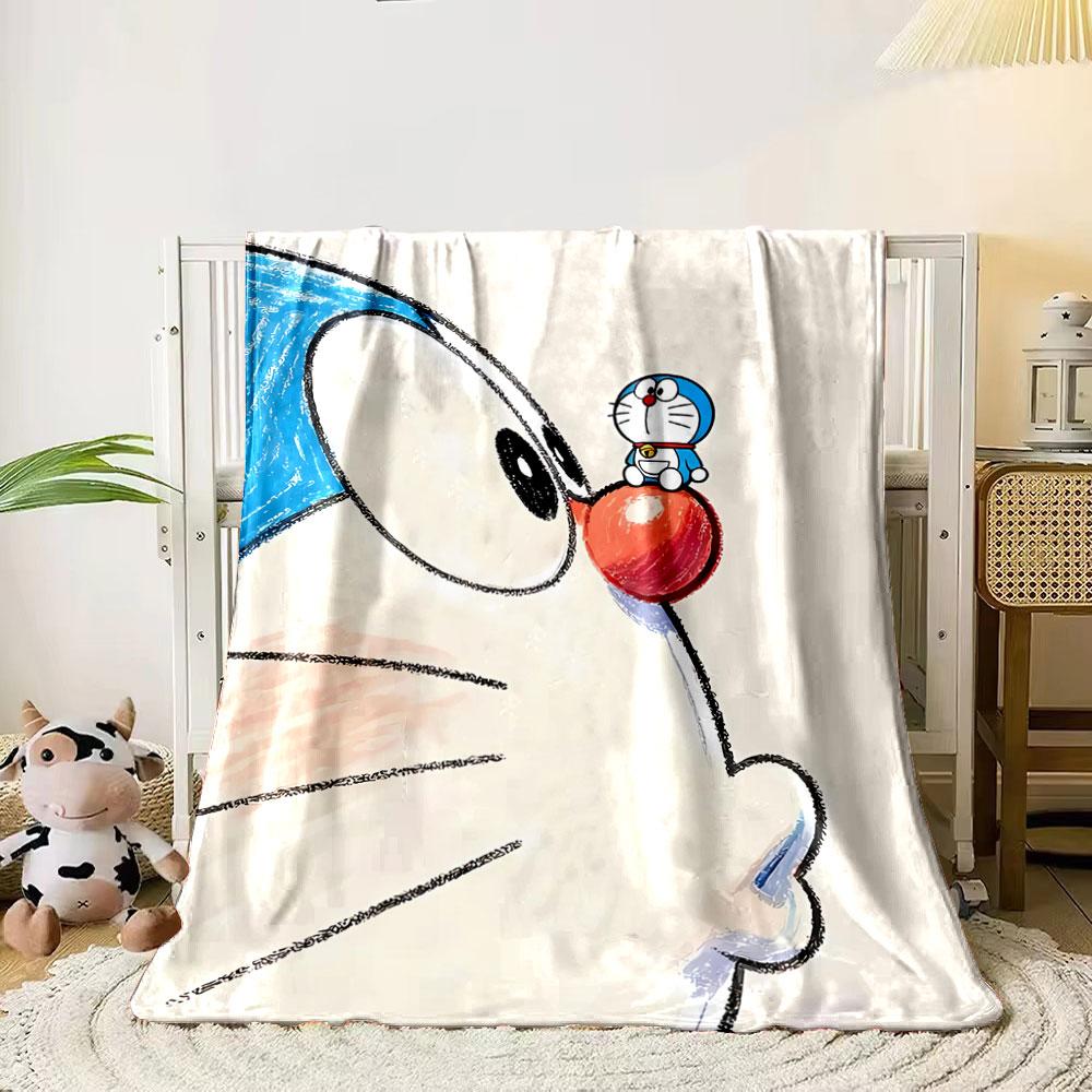 A blue robotic cat with a smaller version of itself on its red nose. for all seasons blanket lunch break throw gift 80cm x 120cm