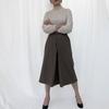 Olgangdijainseutyudio Long Diagonal Pleated Skirt