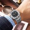 Jin Shidun Men's Luminous Quartz Skeleton Watch with Steel Band and Date Display.