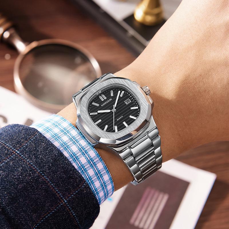 Jin Shidun Men's Luminous Quartz Skeleton Watch with Steel Band and Date Display.